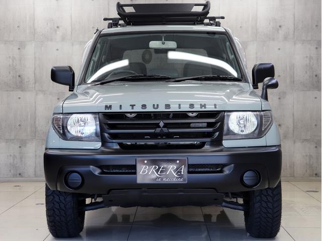 パジェロイオ ZX 4WD BRERAオリジナルカスタム 新品社外アルミホイール 新品マッドテレーンタイヤ 新品ルーフラック&新品ベースキャリア インナーブラックヘッドライト テールランプブラックアウト ETC キーレス(6枚目)