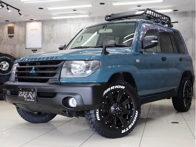 パジェロイオ パールパッケージ　ナビエディション　４ＷＤ　ブレラＯＧカスタム　新品社外ＡＷ　新品マッドテレーンタイヤ　新品ルーフラック＆新品ベースキャリア　インナーブラックヘッドライト　テールランプブラックアウト　マットブラック塗分　ＥＴＣ（3枚目）