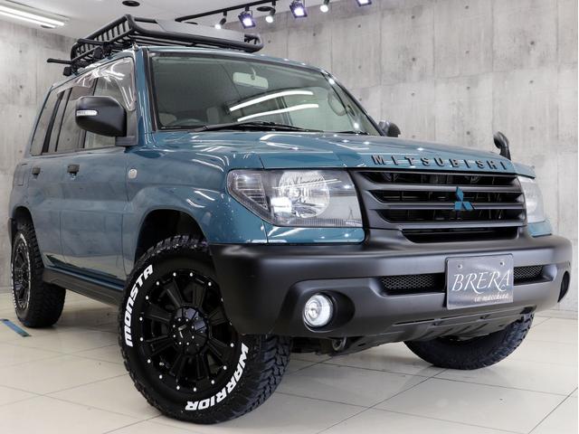 パジェロイオ パールパッケージ　ナビエディション　４ＷＤ　ブレラＯＧカスタム　新品社外ＡＷ　新品マッドテレーンタイヤ　新品ルーフラック＆新品ベースキャリア　インナーブラックヘッドライト　テールランプブラックアウト　マットブラック塗分　ＥＴＣ（5枚目）