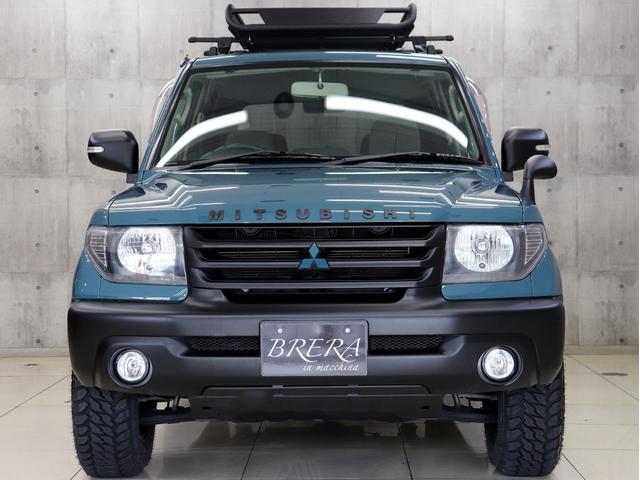 パジェロイオ パールパッケージ　ナビエディション　４ＷＤ　ブレラＯＧカスタム　新品社外ＡＷ　新品マッドテレーンタイヤ　新品ルーフラック＆新品ベースキャリア　インナーブラックヘッドライト　テールランプブラックアウト　マットブラック塗分　ＥＴＣ（6枚目）