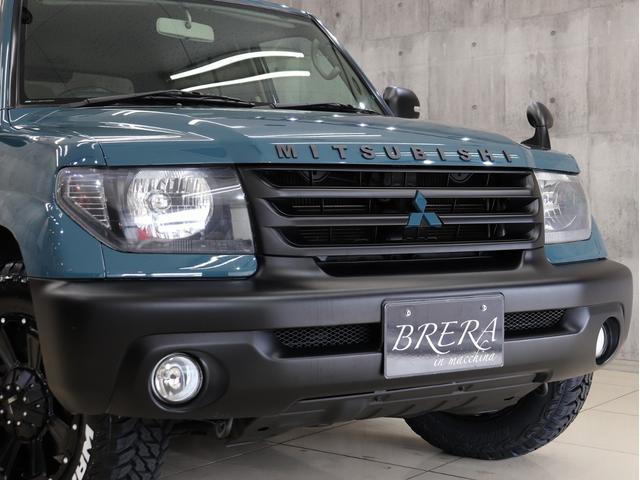 パジェロイオ パールパッケージ　ナビエディション　４ＷＤ　ブレラＯＧカスタム　新品社外ＡＷ　新品マッドテレーンタイヤ　新品ルーフラック＆新品ベースキャリア　インナーブラックヘッドライト　テールランプブラックアウト　マットブラック塗分　ＥＴＣ（16枚目）