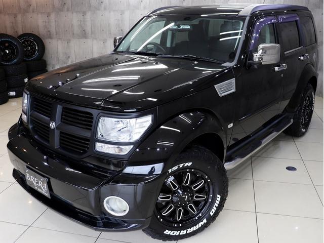 ダッジ・ナイトロ ＳＸＴ　４ＷＤ　ブレラＯＧカスタム　新品社外アルミホイール　新品モンスタマッドテレーンタイヤ　マットブラック塗装済フロントグリル　社外ナビＴＶ　純正サイドカメラ　クルーズコントロール　キーレス（2枚目）