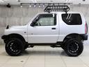 ランドベンチャー　４ＷＤ　ターボ　５ＭＴ　リフトアップ　社外ＡＷ　マッドテレーンタイヤ　新品ルーフラック　前後スキッドバンパー　インナーブラックヘッドライト　社外テールランプ　社外マフラー　社外ディスプレイオーディオ（11枚目）