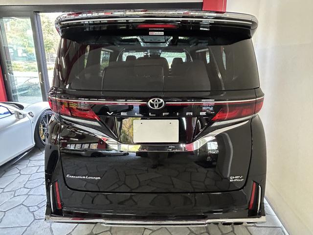 ヴェルファイアハイブリッド エグゼクティブラウンジ モデリスタエアロパーツ シグネイチャーイルミ ルーフイルミスポイラー クールシャインキット ユニバーサルステップ 寒冷地仕様(3枚目)