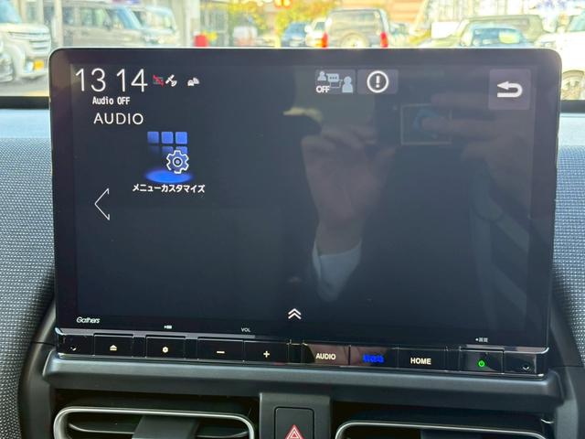 フリード e:HEVエアー EX登録済未使用車 マルチビューカメラ 純正11.4インチナビ ETC2.0 BSI・後退出庫サポート アダプティブドライビングビーム 両側電動スライドドア シートヒーター レザー調コンビシート リアクーラー パーキングセンサー 専用アルミ(27枚目)