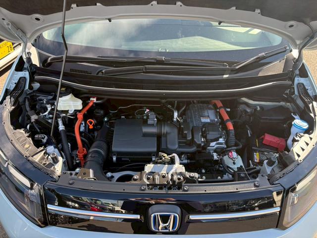 フリード e:HEVエアー EX登録済未使用車 マルチビューカメラ 純正11.4インチナビ ETC2.0 BSI・後退出庫サポート アダプティブドライビングビーム 両側電動スライドドア シートヒーター レザー調コンビシート リアクーラー パーキングセンサー 専用アルミ(52枚目)