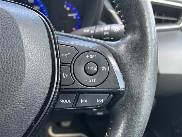 カローラツーリング ハイブリッド ダブルバイビー 禁煙車/衝突軽減/ブラインドスポットモニター/レーダークルーズコントロール/純正9型ディスプレイオーディオ/バックカメラ/前席シートヒーター/ステアリングヒーター/ビルトインETC/ドライブレコーダー(5枚目)