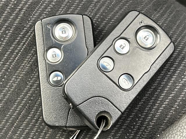 フリードハイブリッド ジャストセレクション 禁煙車/両側電動ドア/クルーズコントロール/バックカメラ/ビルトインETC/フルセグテレビ/7インチナビ/純正15インチアルミ/純正フロアマット/冬タイヤ積込/スマートキー/スペアキー/横滑り防止機能(10枚目)