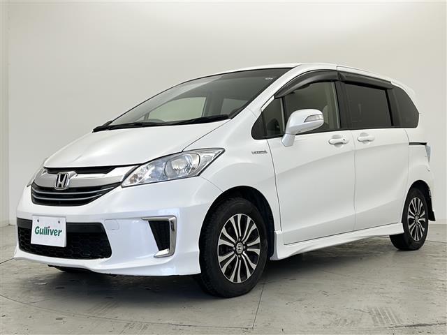 フリードハイブリッド ジャストセレクション 禁煙車/両側電動ドア/クルーズコントロール/バックカメラ/ビルトインETC/フルセグテレビ/7インチナビ/純正15インチアルミ/純正フロアマット/冬タイヤ積込/スマートキー/スペアキー/横滑り防止機能(18枚目)