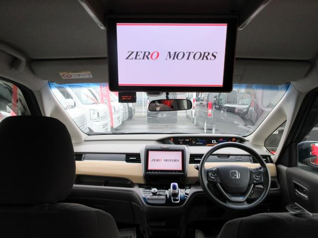 フリードハイブリッド ハイブリッド・Gホンダセンシング 6人 修復歴無し ブレーキサポート 9インチナビ フルセグTV バックカメラ ブルートゥース対応 9インチフリップダウンモニター 両側電動スライドドア アダプティブクルーズコントロール LEDライト(44枚目)