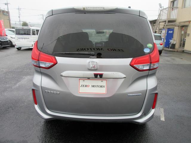 フリードハイブリッド ハイブリッド・Ｇホンダセンシング　Ｓパッケージ　６人　４ＷＤ　ブレーキサポート　ナビ　フルセグＴＶ　ブルートゥース対応　バックカメラ　ＬＥＤヘッドライト　両側電動スライドドア　左右シートヒーター　アダプティブクルーズコントロール（5枚目）