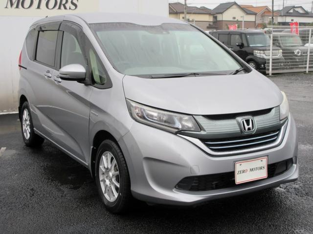 フリードハイブリッド ハイブリッド・Ｇホンダセンシング　Ｓパッケージ　６人　４ＷＤ　ブレーキサポート　ナビ　フルセグＴＶ　ブルートゥース対応　バックカメラ　ＬＥＤヘッドライト　両側電動スライドドア　左右シートヒーター　アダプティブクルーズコントロール（11枚目）