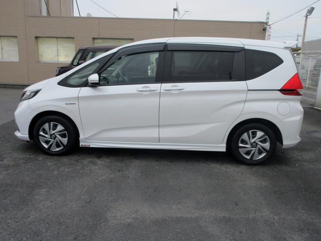 フリードハイブリッド ハイブリッド・Ｇホンダセンシング　ブレーキサポート　６人　後期　ナビ　フルセグＴＶ　Ｂｌｕｅｔｏｏｔｈ対応　前後ドライブレコーダー　バックカメラ　ＤＶＤ再生　左右シートヒーター　アダクティブクルーズコントロール　スマートキー　ＥＴＣ（9枚目）