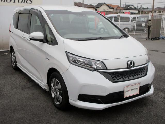 フリードハイブリッド ハイブリッド・Ｇホンダセンシング　ブレーキサポート　６人　後期　ナビ　フルセグＴＶ　Ｂｌｕｅｔｏｏｔｈ対応　前後ドライブレコーダー　バックカメラ　ＤＶＤ再生　左右シートヒーター　アダクティブクルーズコントロール　スマートキー　ＥＴＣ（11枚目）