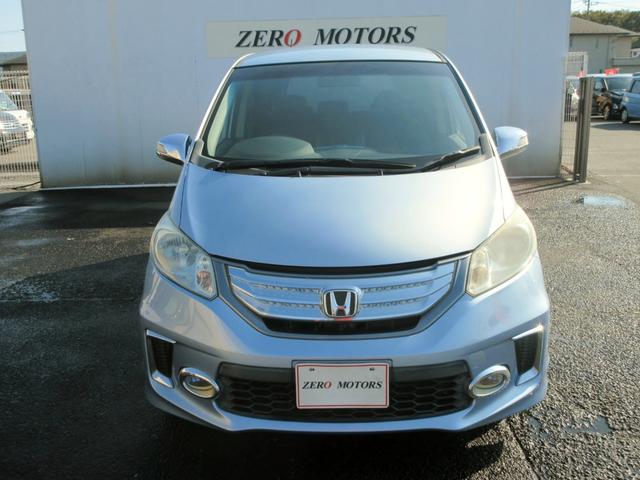 フリードハイブリッド ジャストセレクション　７人　修復歴無し　ＨＤＤナビ　ＴＶ　ブルートゥース対応　ＴＶ　バックカメラ　ＥＴＣ　クルーズコントロール　スマートキー　両側電動スライドドア　ＨＩＤ　アイドリングストップ（3枚目）