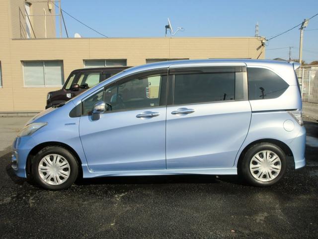 フリードハイブリッド ジャストセレクション　７人　修復歴無し　ＨＤＤナビ　ＴＶ　ブルートゥース対応　ＴＶ　バックカメラ　ＥＴＣ　クルーズコントロール　スマートキー　両側電動スライドドア　ＨＩＤ　アイドリングストップ（9枚目）