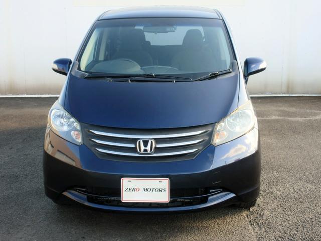 フリード Ｇ　ジャストセレクション　７人乗り　ナビ　フルセグＴＶ　ブルートゥース対応　バックカメラ　１０．２インチフリップダウンモニター　スマートキー　両側電動スライドドア　ＥＴＣ　電動格納ミラー（3枚目）