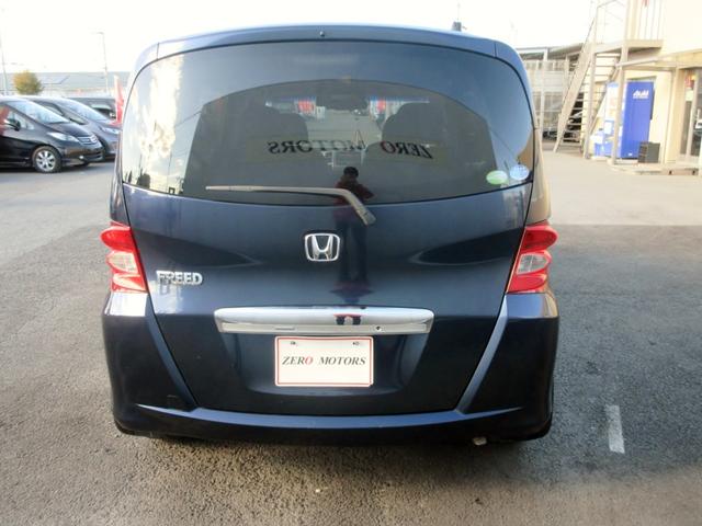 フリード Ｇ　ジャストセレクション　７人乗り　ナビ　フルセグＴＶ　ブルートゥース対応　バックカメラ　１０．２インチフリップダウンモニター　スマートキー　両側電動スライドドア　ＥＴＣ　電動格納ミラー（5枚目）