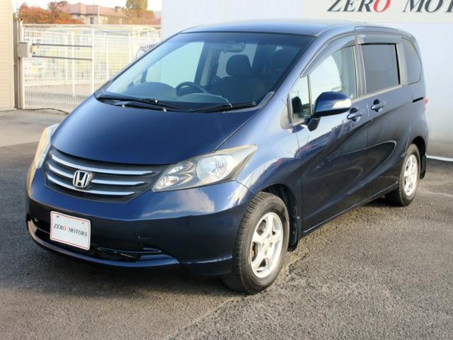 フリード Ｇ　ジャストセレクション　７人乗り　ナビ　フルセグＴＶ　ブルートゥース対応　バックカメラ　１０．２インチフリップダウンモニター　スマートキー　両側電動スライドドア　ＥＴＣ　電動格納ミラー（13枚目）