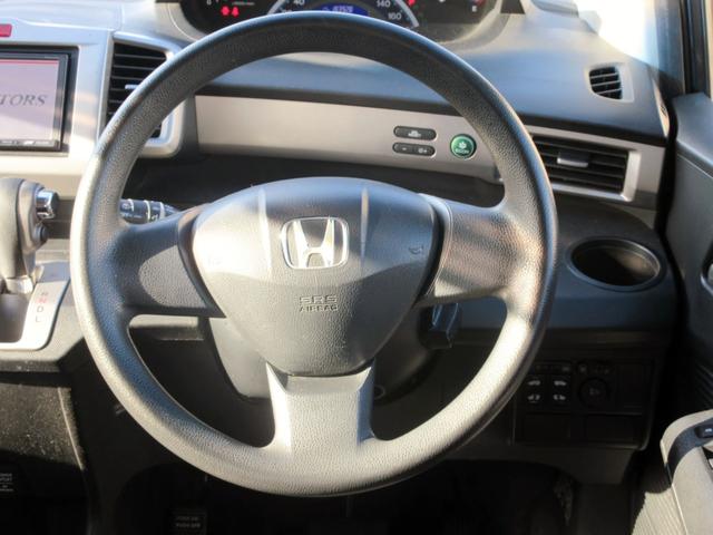 フリード Ｇ　ジャストセレクション　７人乗り　ナビ　フルセグＴＶ　ブルートゥース対応　バックカメラ　１０．２インチフリップダウンモニター　スマートキー　両側電動スライドドア　ＥＴＣ　電動格納ミラー（37枚目）