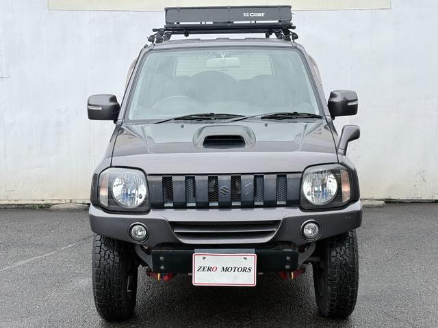 ジムニー クロスアドベンチャーXC 8型 車検2年付 修復歴無 リフトアップ 5MT 4WD ターボ シートヒーター レザーシート Bluetoothオーディオ CD AUX ETC アルミホイール 社外マフラー ショートバンパー(3枚目)