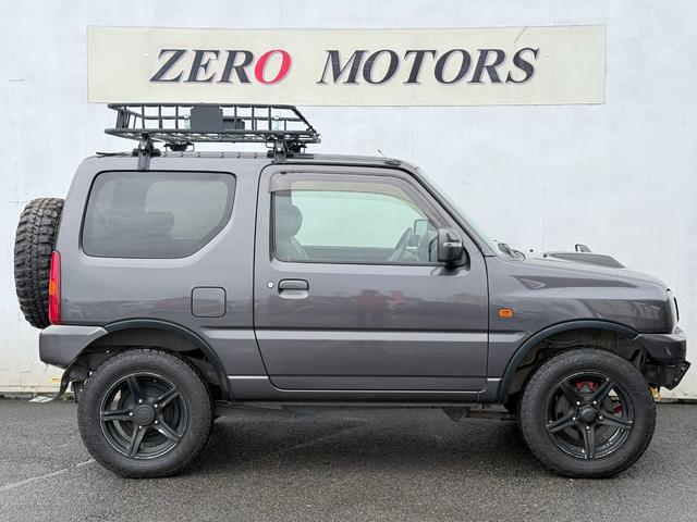 ジムニー クロスアドベンチャーXC 8型 車検2年付 修復歴無 リフトアップ 5MT 4WD ターボ シートヒーター レザーシート Bluetoothオーディオ CD AUX ETC アルミホイール 社外マフラー ショートバンパー(9枚目)