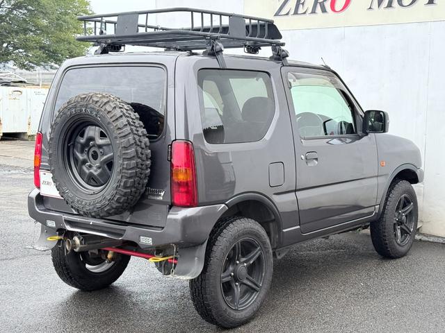 ジムニー クロスアドベンチャーXC 8型 車検2年付 修復歴無 リフトアップ 5MT 4WD ターボ シートヒーター レザーシート Bluetoothオーディオ CD AUX ETC アルミホイール 社外マフラー ショートバンパー(17枚目)