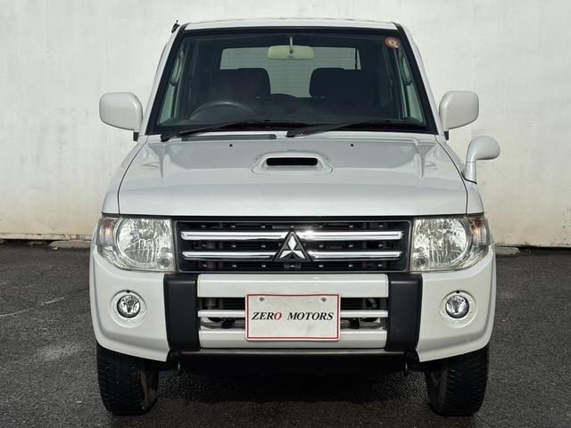 パジェロミニ ＶＲ　４ＷＤ　ターボ　修復歴無　車検２年付　ＣＤ　ＡＵＸ接続　タイミングベルト交換済　アルミホイール　キーレスキー　電動格納ドアミラー　ドアバイザー　ＡＢＳ　プライバシーガラス　レベライザー　フルフラット（3枚目）