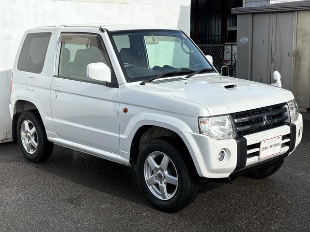 パジェロミニ ＶＲ　４ＷＤ　ターボ　修復歴無　車検２年付　ＣＤ　ＡＵＸ接続　タイミングベルト交換済　アルミホイール　キーレスキー　電動格納ドアミラー　ドアバイザー　ＡＢＳ　プライバシーガラス　レベライザー　フルフラット（5枚目）