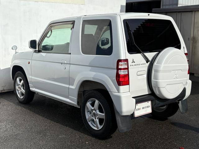 パジェロミニ ＶＲ　４ＷＤ　ターボ　修復歴無　車検２年付　ＣＤ　ＡＵＸ接続　タイミングベルト交換済　アルミホイール　キーレスキー　電動格納ドアミラー　ドアバイザー　ＡＢＳ　プライバシーガラス　レベライザー　フルフラット（15枚目）