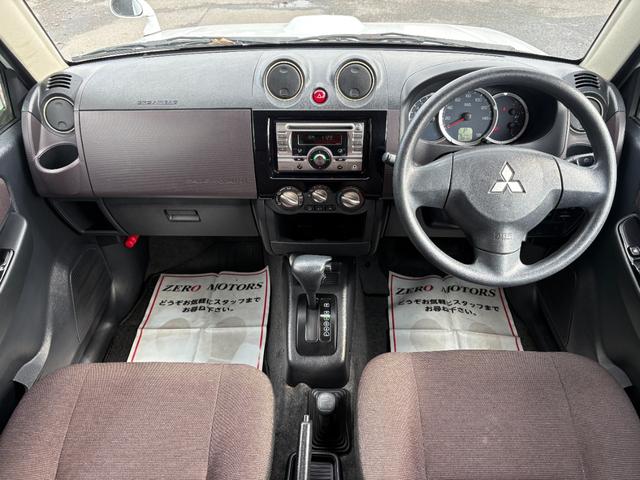 パジェロミニ ＶＲ　４ＷＤ　ターボ　修復歴無　車検２年付　ＣＤ　ＡＵＸ接続　タイミングベルト交換済　アルミホイール　キーレスキー　電動格納ドアミラー　ドアバイザー　ＡＢＳ　プライバシーガラス　レベライザー　フルフラット（23枚目）