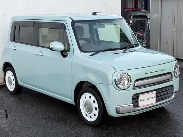 アルトラパンショコラ Ｘ　車検２年付　ナビ（テレビ・Ｂｌｕｅｔｏｏｔｈ接続・ＡＵＸ接続）バックカメラ　アルミホイール　ＨＩＤライト　オートエアコン　ドアバイザー　専用レザーシート　プライバシーガラス　電動格納ドアミラー（5枚目）