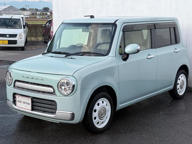 アルトラパンショコラ Ｘ　車検２年付　ナビ（テレビ・Ｂｌｕｅｔｏｏｔｈ接続・ＡＵＸ接続）バックカメラ　アルミホイール　ＨＩＤライト　オートエアコン　ドアバイザー　専用レザーシート　プライバシーガラス　電動格納ドアミラー（7枚目）