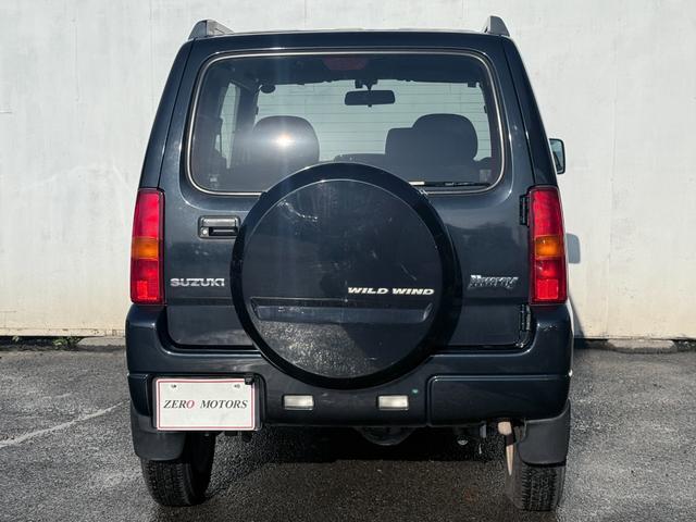 ジムニー ワイルドウインド　６型　ターボ　４ＷＤ　ナビ　フルセグテレビ　ＤＶＤ再生　ＣＤ　バックカメラ　ＥＴＣ　シートヒーター　電動格納ドアミラー　アルミホイール　ドアバイザー　ライトレベライザー（13枚目）