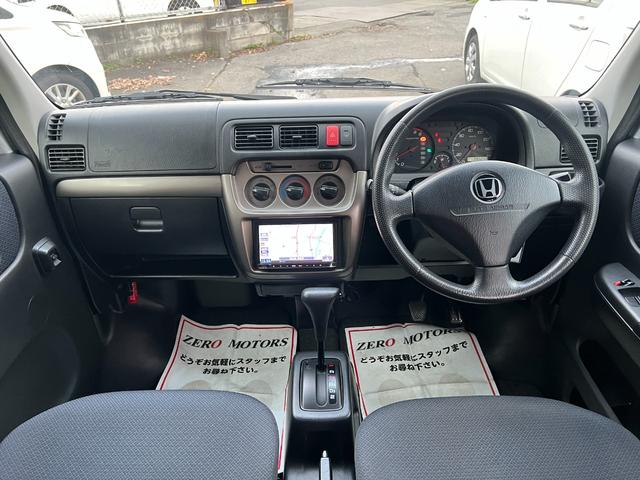 バモスホビオプロ ベースグレード 後期 4WD 車検2年付 修復歴無 ハイルーフ キーレス パワーウィンドウ ナビ テレビ DVD再生 CD ETC アルミホイール ドアバイザー ライトレベライザー フルフラット プライバシーガラス(23枚目)