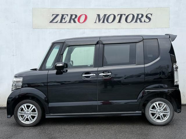N-BOXカスタム G・Lパッケージ 修復歴無 車検2年付 ナビ(テレビ・CD)バックカメラ 両側電動スライド アルミホイール ドアバイザー フルフラット オートエアコン スマートキー 電動格納ドアミラー 盗難防止システム HIDライト(11枚目)