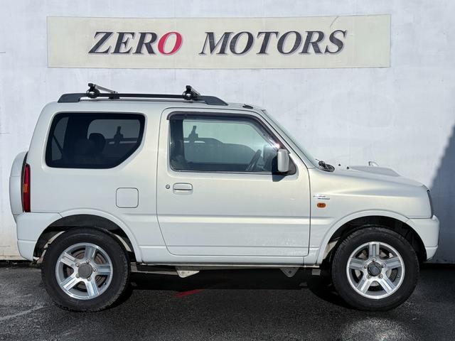 ジムニー ワイルドウインド　６型　ターボ　４ＷＤ　ＣＤ　ＭＤ　ＥＴＣ　アルミホイール　シートヒーター　フルフラット　ドアバイザー　キーレスキー　ライトレベライザー　フォグライト　エアコン　パワステ（9枚目）