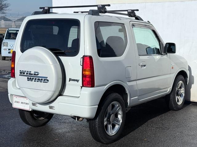 ジムニー ワイルドウインド　６型　ターボ　４ＷＤ　ＣＤ　ＭＤ　ＥＴＣ　アルミホイール　シートヒーター　フルフラット　ドアバイザー　キーレスキー　ライトレベライザー　フォグライト　エアコン　パワステ（17枚目）