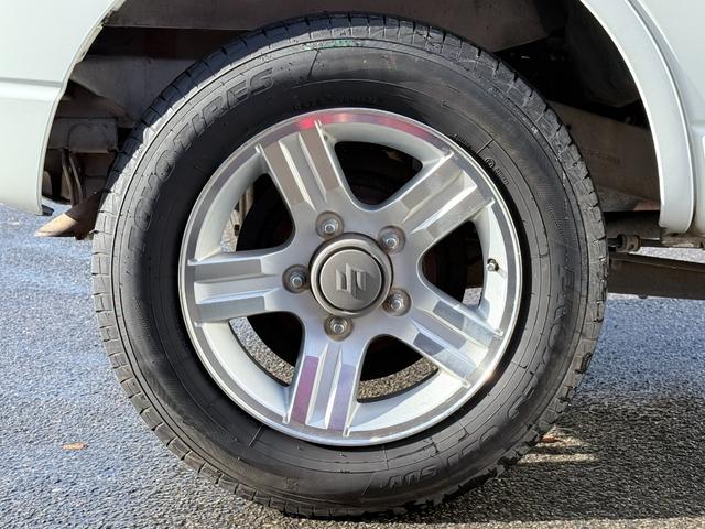 ジムニー ワイルドウインド　６型　ターボ　４ＷＤ　ＣＤ　ＭＤ　ＥＴＣ　アルミホイール　シートヒーター　フルフラット　ドアバイザー　キーレスキー　ライトレベライザー　フォグライト　エアコン　パワステ（51枚目）