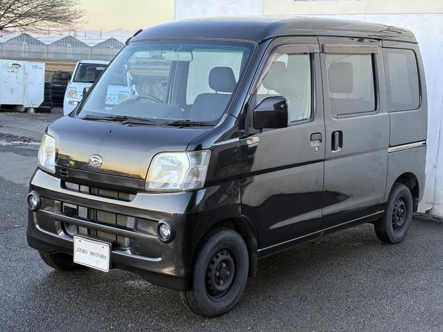 ハイゼットカーゴ クルーズターボ 車検2年付 4WD ハイルーフ 修復歴無 キーレス パワーウィンドウ 電動格納ドアミラー ETC CD ドアバイザー オーバーヘッドコンソール フルフラット フォグライト ABS タイミングチェーン式(7枚目)