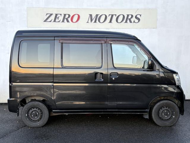 ハイゼットカーゴ クルーズターボ 車検2年付 4WD ハイルーフ 修復歴無 キーレス パワーウィンドウ 電動格納ドアミラー ETC CD ドアバイザー オーバーヘッドコンソール フルフラット フォグライト ABS タイミングチェーン式(9枚目)