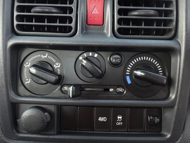 キャリイトラック ＫＣエアコン・パワステ　４ＷＤ　５ＭＴ　エアコン　パワステ　３方開　横滑り防止装置　ドアバイザー　オートライト　ＡＢＳ　タイミングチェーン式　エアバッグ（35枚目）