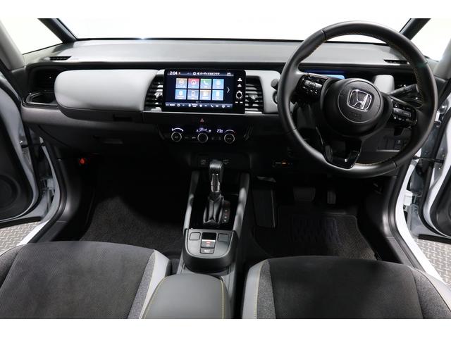 フィット e:HEVRS 禁煙車 センシング デモカー Bluetooth対応コネクトナビ Bカメラ ドラレコ 渋滞追従アダプティブクルーズコントロール ETC フルセグテレビ LEDヘッドランプ 2年間走行無制限保証 半革(8枚目)
