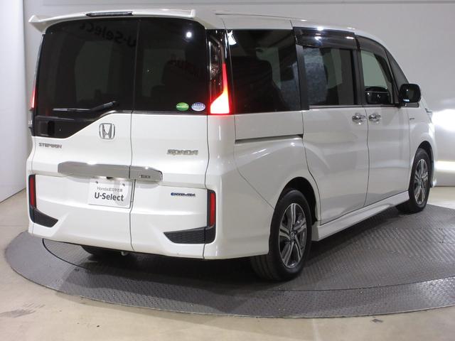 ステップワゴンスパーダ スパーダハイブリッドＧホンダセンシング　純正９インチメモリーナビＢｌｕｅｔｏｏｔｈＥＴＣＲカメラ　ＣＭＢＳ　リヤカメラ　スマキー　Ａストップ　ＥＳＣ　ＵＳＢ入力　両側自動ドア　オートエアコン　ＬＥＤヘッドライト　クルーズコントロール　地デジ（8枚目）