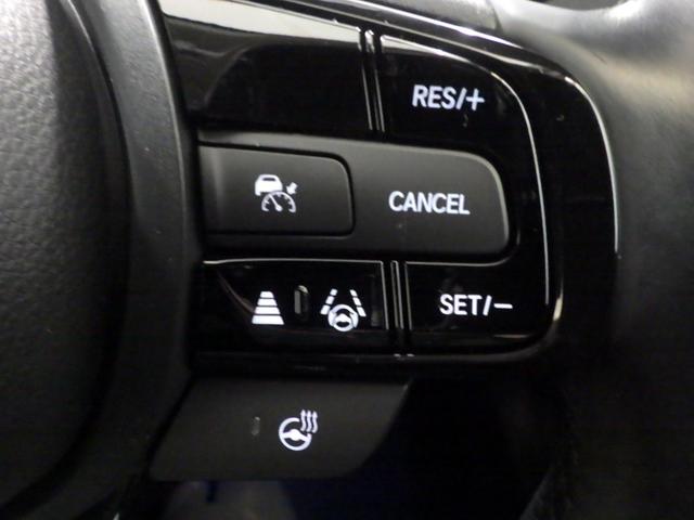 ヴェゼル ｅ：ＨＥＶＺ　禁煙・コネクトディスプレイ・マルチビュー・ＬＥＤ・オートライト・ＥＴＣ・前席ヒーター・Ｄレコ・ブラインドスポット・パワーテールゲート・革巻・パドル・ステアリングヒーター・後退出庫サポート・１８ＡＷ（11枚目）