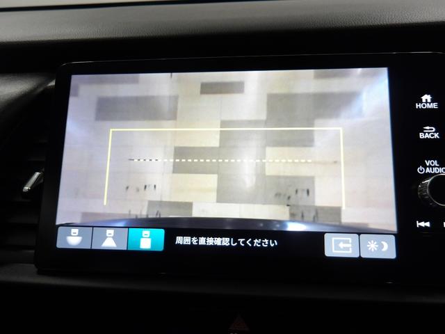 フィット ｅ：ＨＥＶホーム　禁煙車・元デモカー・コネクトディスプレイ・Ｒカメラ・ＬＥＤ・オートライト・ＥＴＣ・革巻・フルオートエアコン・電子パーキングブレーキ・コンビシート・　前後誤発進抑制機能　クリソナ　助手席エアバッグ（3枚目）