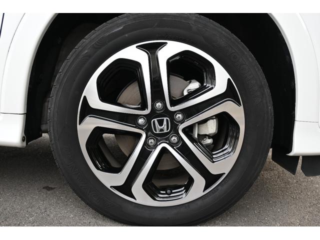 ヴェゼル ハイブリッドZ・ホンダセンシング 純正8INナビ Rカメラ ETC FRドラレコ シートヒーター アルミホイール LEDライト レーダーサポート 1オーナ- DVD再生機能 整備記録簿 横滑り防止システム バックアイカメラ フルセ(24枚目)