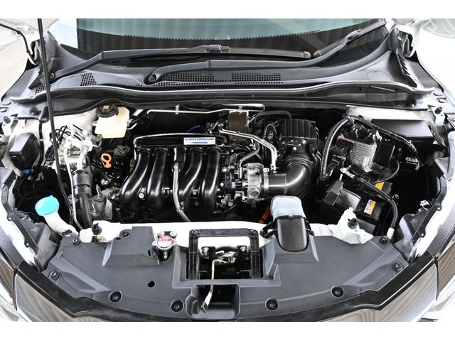 ヴェゼル ハイブリッドZ・ホンダセンシング 純正8INナビ Rカメラ ETC FRドラレコ シートヒーター アルミホイール LEDライト レーダーサポート 1オーナ- DVD再生機能 整備記録簿 横滑り防止システム バックアイカメラ フルセ(25枚目)