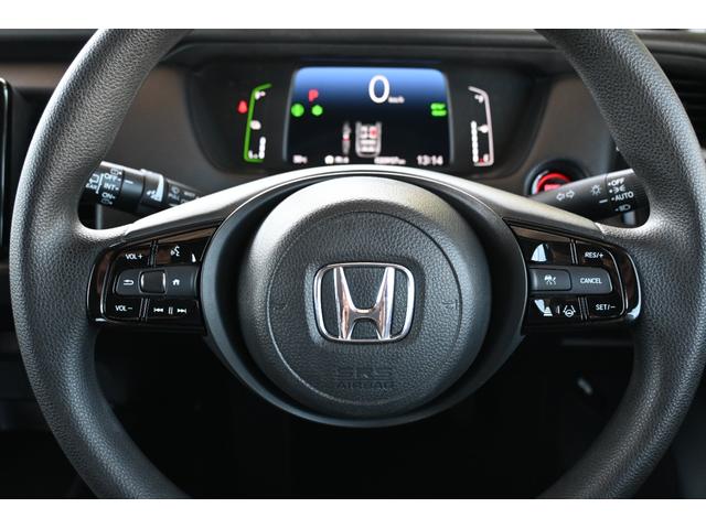 フィット e:HEVベーシック ホンダセンシング 純正ナビ Rカメラ 障害物センサー LEDライト ホンダコネクト カーテンエアバッグ CMBS USBポート ワンオーナー車 セキュリティアラーム アイドリングストップ スマートキー(13枚目)