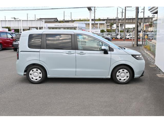 フリード エアー 登録済未使用車 ホンダセンシング 純正8INナビ Rカメラ ETC Fドラレコ 障害物センサー LEDライト 両側Pスライドドア クルコン 横滑り防止機能 サイドカーテンエアバック USB 3列シート(9枚目)